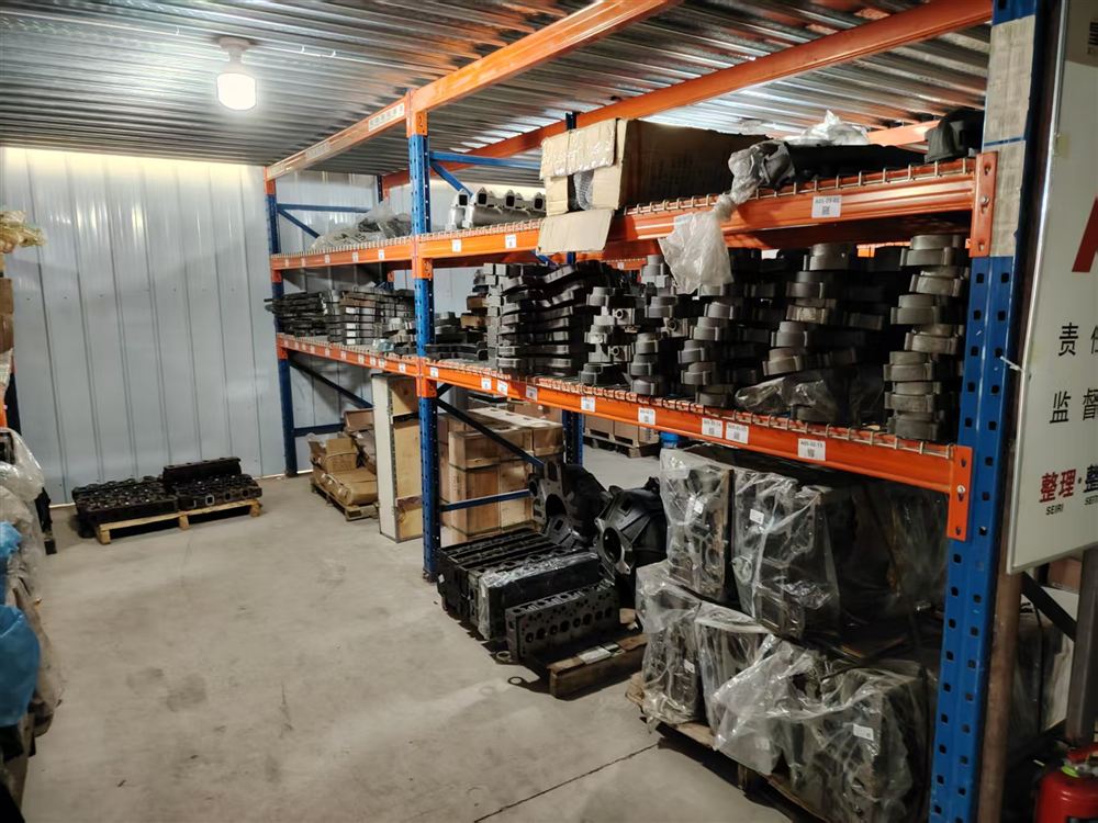 Engine components on warehouse storage racks
