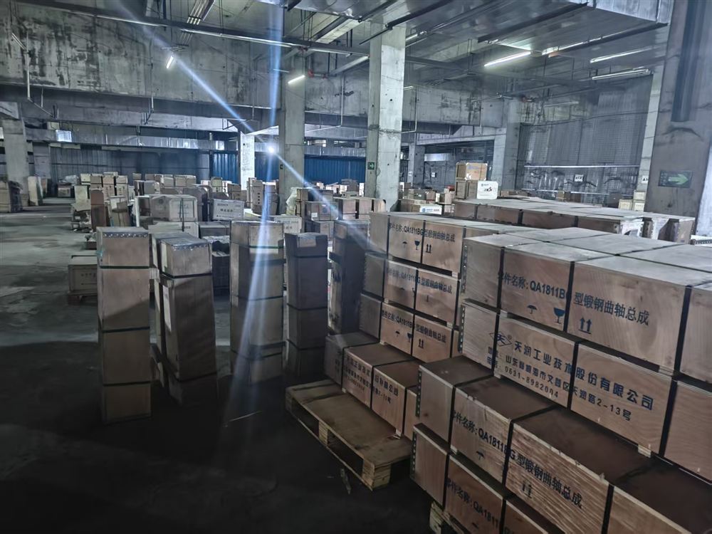 Rows of boxed diesel engine parts ready for shipment